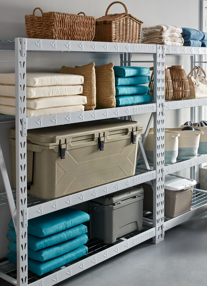 Various storage devices, pillows and outdoor chair cushions stored on a Gladiator brand rack system.
